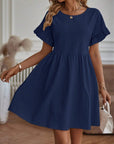 Flared dress with ruffled sleeves