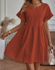 Flared dress with ruffled sleeves