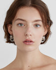 Twisted hoop statement earrings in gold or silver