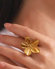 Adjustable gold blossom statement ring