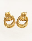 Twisted hoop statement earrings in gold or silver