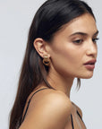 Twisted hoop statement earrings in gold or silver