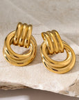 Twisted hoop statement earrings in gold or silver